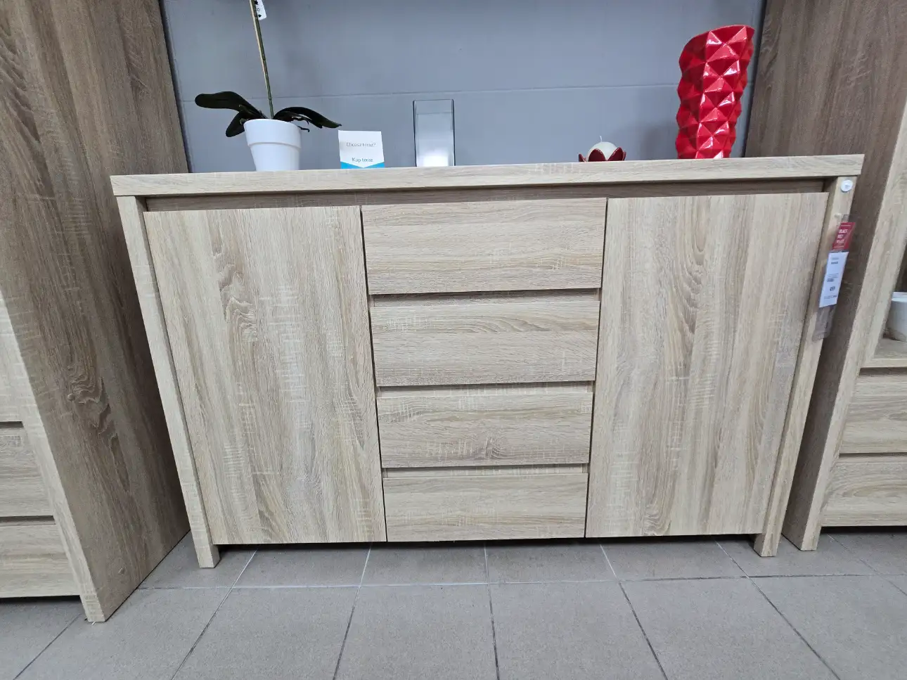 Black Red White Komoda KASPIAN dąb sonoma z 2 drzwiami i 4 szufladami 144 cm 